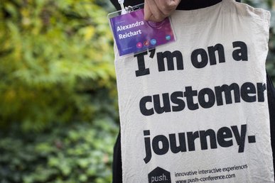 Jutebeutel der push conference 2016 mit der Aufschrift I'm on a customer Journey